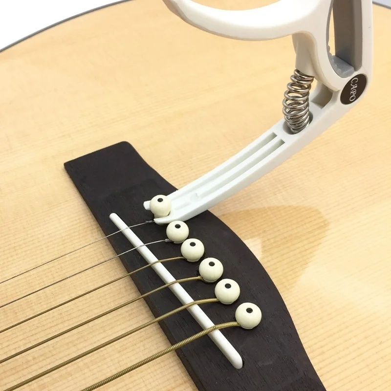 كابو جيتار بلاستيكي مكون من 6  - مراجعة Musical Instrument Gif وسعره