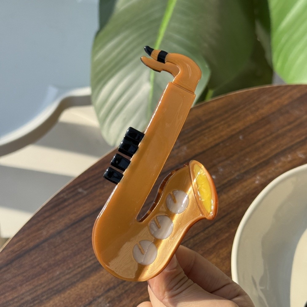 مشبك شعر جديد من أسيتات حمض ال - مراجعة Musical Instrument Video وسعره